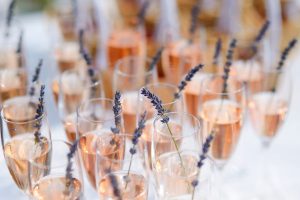 Glasses of with champagne decorated with lavender